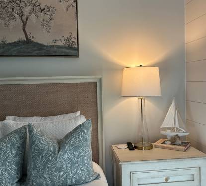 Spacious 2nd level queen bedroom suite with full ensuite bathroom, tiled shower, and a large vanity.