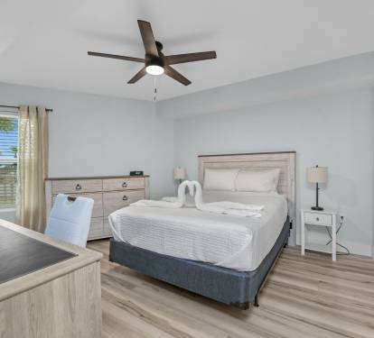 2nd Bedroom with Desk and extra monitor for remote work.