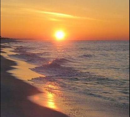 Enjoy this sunset while relaxing in a beach chair - PRICELESS!