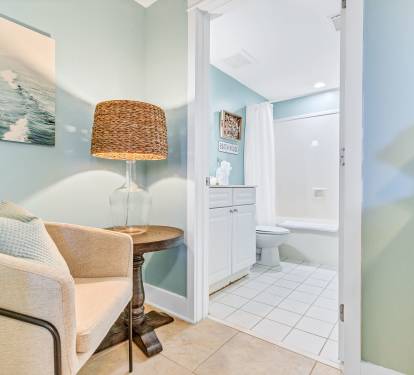 Quaint siting area just outside of the master suite bathroom.