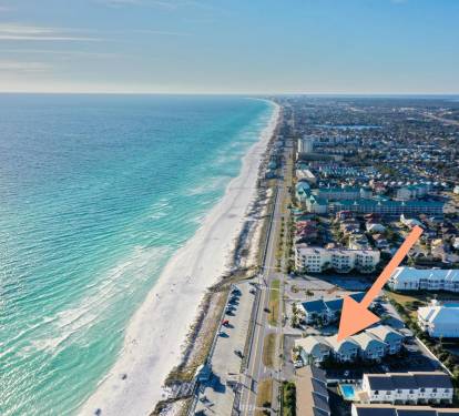 Talk about a prime location! You're steps away from soaking your toes in emerald waters and sugary white Miramar beach, directly across the street. 