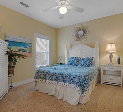 Second floor guest bedroom with queen bed