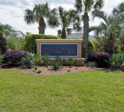 The entry sign on scenic 98 for our community