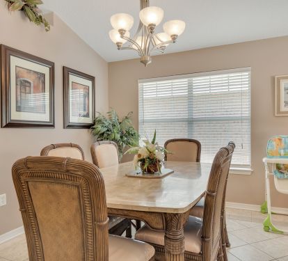 Large dining table seats 6 - we also have a high chair for little ones!