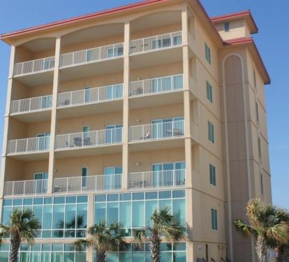 The back side of the condo looking up from the beach.  The condo occupies the entire 5th floor of this bulding.  The balcony is huge with awesome views
