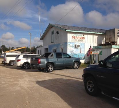 Aquila Fresh Seafood and shrimp boat docks less than a mile from the cottages.