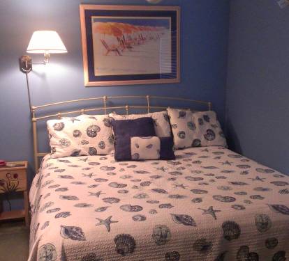 Comfortable king bed in the master bedroom.
