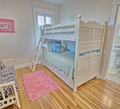 Kids bunk room with trundle bunk for 3 kiddos,  full bath