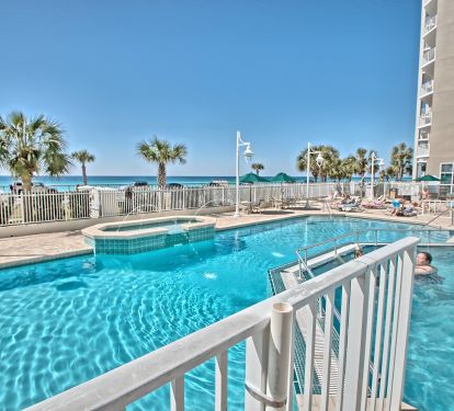 multi level pool spills over to lower level. Kids will Love this pool !!