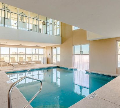 Heated Indoor swim-thru pool with workout room above.. 