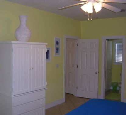 Large tv in armoire in upstairs guest bedroom