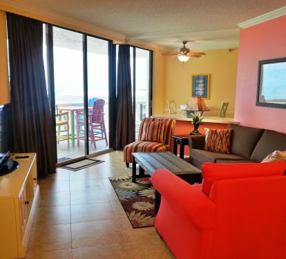 Living Room has a Queen sized sleeper sofa, 2 chairs, Flatscreen TV/DVD Player, iPOD Player  All rooms have Balcony Access