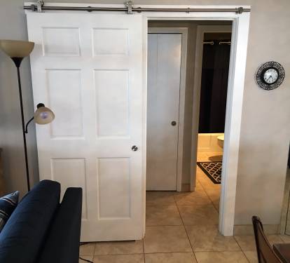 Farmhouse door entrance to 2nd bedroom and bathroom
