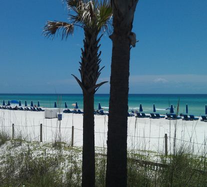 View of our Beach from the Pool Deck.  All Guests receive 1 FREE set of Beach Chairs (3/1-10/31)