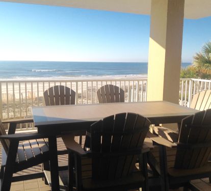 Beautiful new balcony furniture with seating for six.  Also two Adirondack chairs