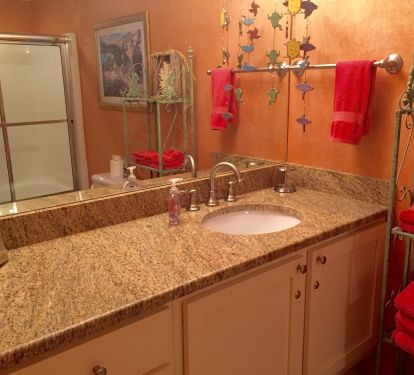 Master bath with new granite and cabinets.  Garden tub shower combo 