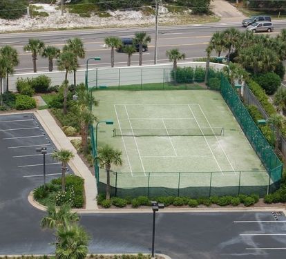 Pelican Pointe lighted tennis court with basketball goal