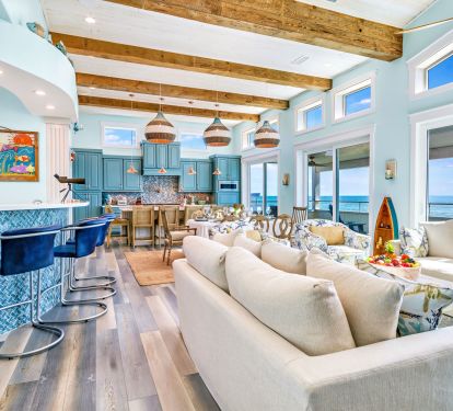 Floor to window glass with ocean views for miles