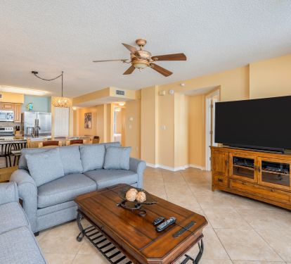 A large curved TV allows for indoor entertaining - plus TVs in each bedroom