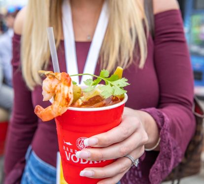 Grab a refreshing cocktail to sip on while walking around the harbor Walk.