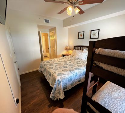 Guest bedroom has direct access to semi-private full bathroom.