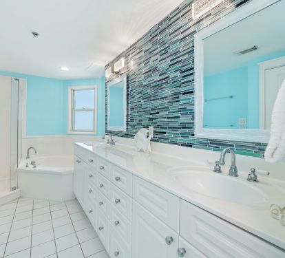 A spacious master bathroom with garden tub and roomy shower
