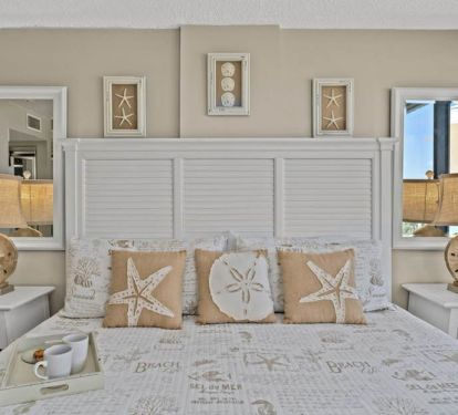 Master bed room with views of the beach for miles-king sized master bed