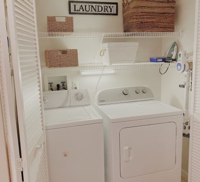 Laundry alcove with Full size washer and dryer