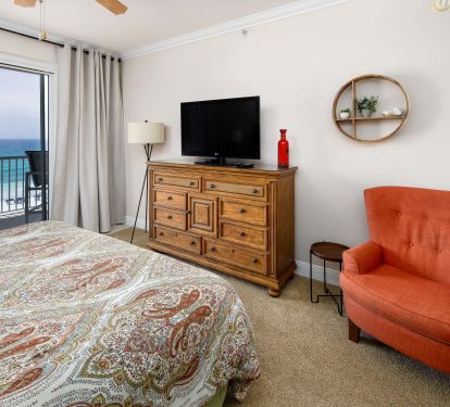 There's direct access to the balcony from the main bedroom. 