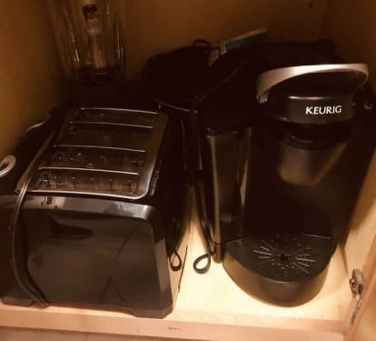 small appliances  there is a Keurig and a regular coffee pot
