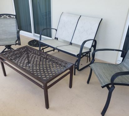 Plenty of furniture on balcony