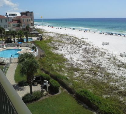 Balcony View looking to Seasonally Heated Pool and Community Charcoal Grills