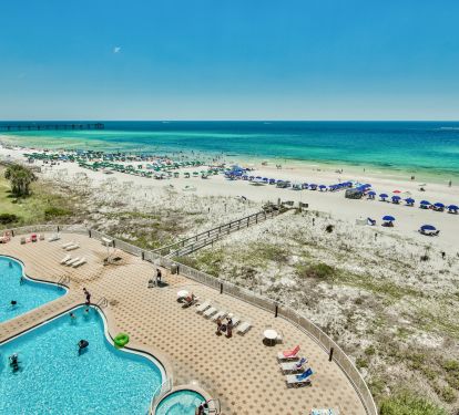 Summer Place has a spacious pool deck with 2 large pools and a hot tub!