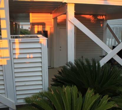 Enclosed Outdoor Shower With Warm and Cold Water.