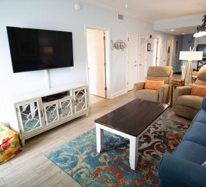 Den - 2 recliners, Queen size sleeper sofa, and a 55" TV