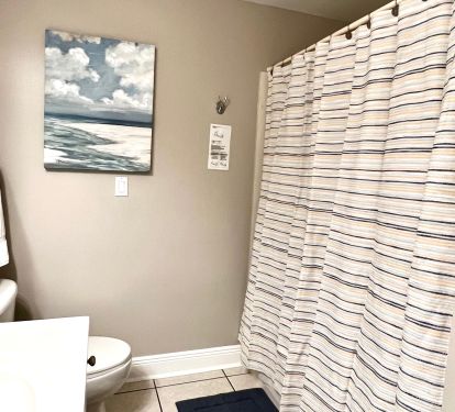 Our spacious primary bedroom has Gulf views and a private bath!