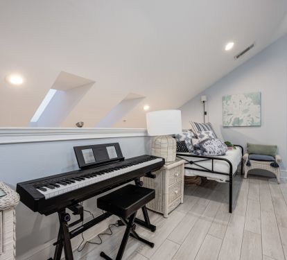 Spacious loft with piano&mdash;perfect for relaxing, playing, or enjoying a quiet moment.