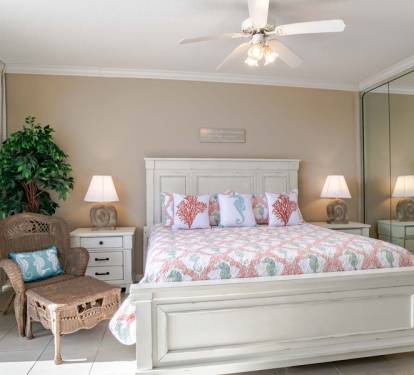 King size bed in spacious master bedroom. 