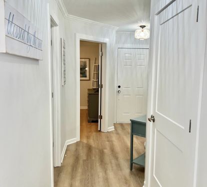 Hallway, to Front Door, Storage, Bedroom and Bathroom.