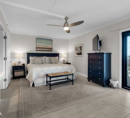 An enormous master bedroom, absolutely stunning, with its own private balcony