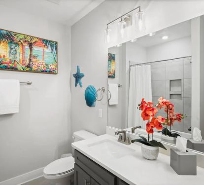Upstairs Bathroom with Dual Vanity, Tub, and Shower