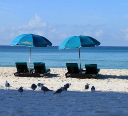 2 Reserved Beach Chairs w/umbrella.