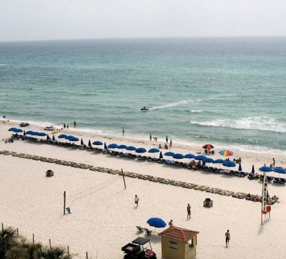 Two beach chairs and umbrella included
