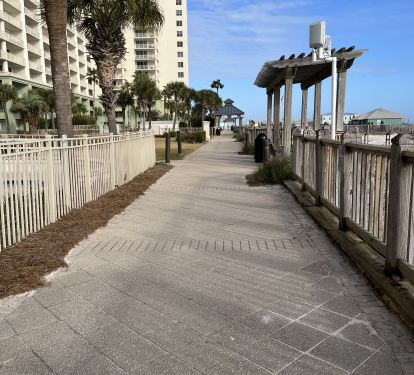 Walkway between the condo towers and the beach