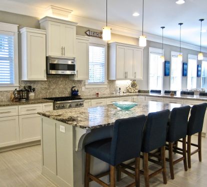 Another view of the gigantic kitchen perfect for preparing family meals