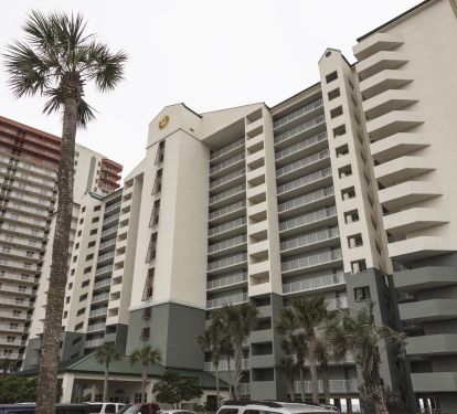 Front of condo with large ground floor parking area no parking decks here!