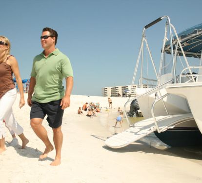 Water Taxi Dropping Off Guest at Beach