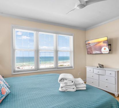Upstairs King primary with Gulf views and private bath