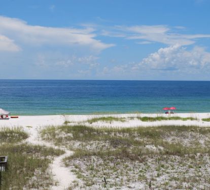 View of private beach from lower level balcony