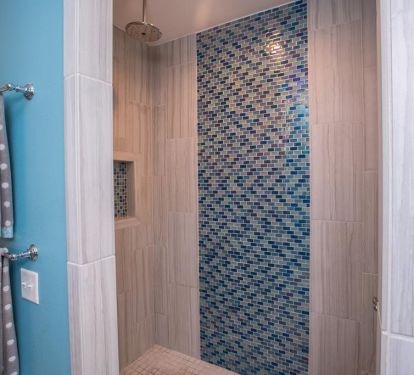 1 of the King rooms with rainfall shower head or the handheld/side-mounted spray